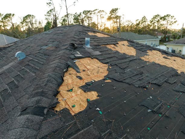 Roof damaged by storm requiring repair