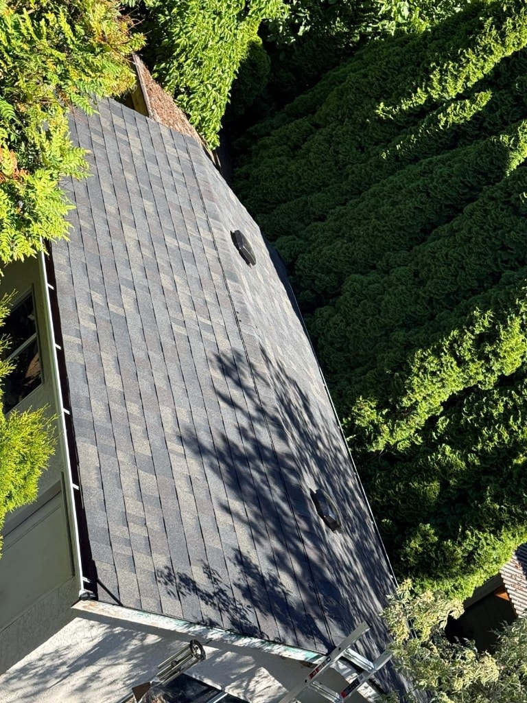 Completed roof with new architectural shingles installed